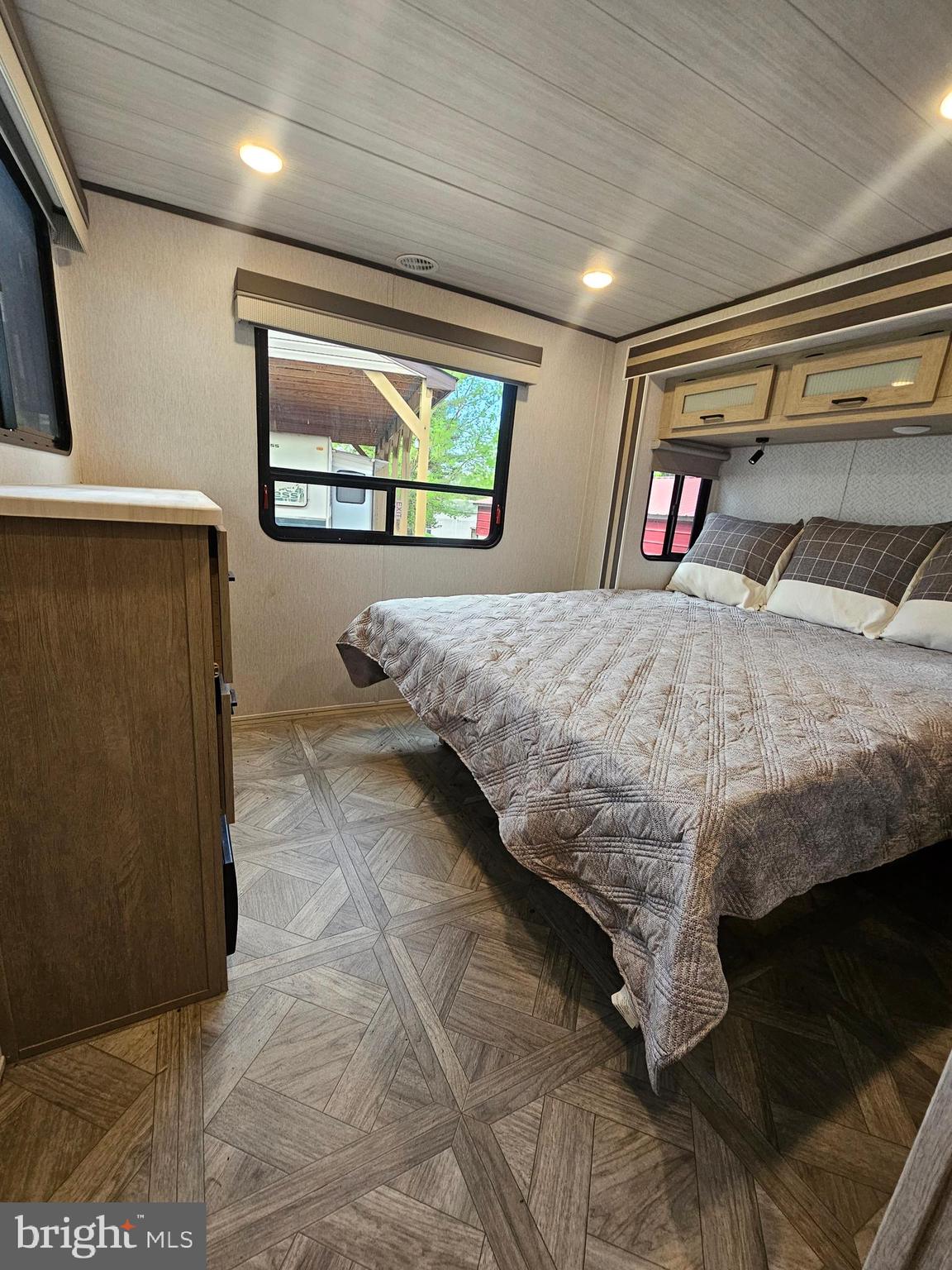 11 Ranger Road Falling Waters, WV 25419 - Photo 31 of 48 a bedroom with a bed and a large window