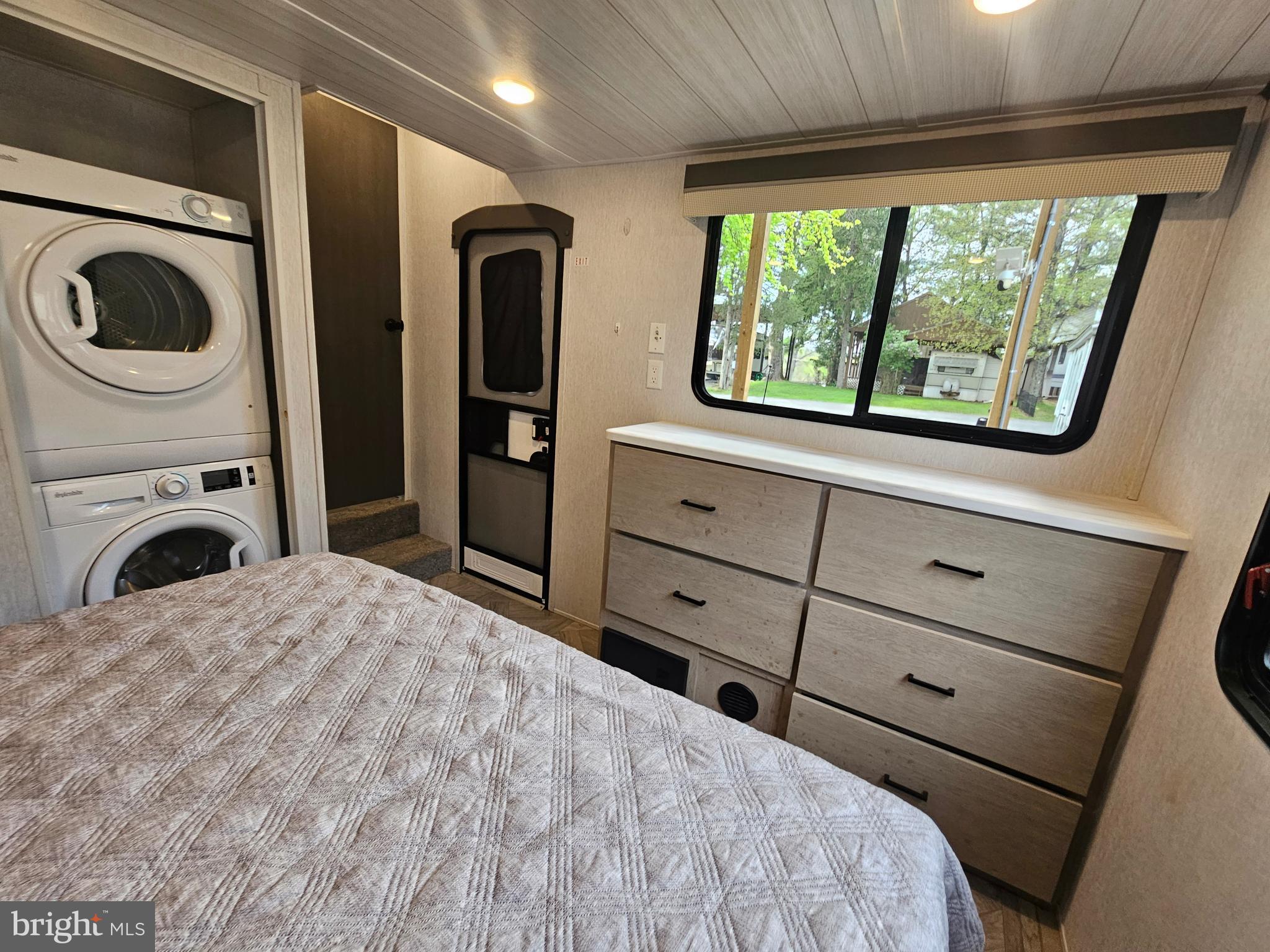 11 Ranger Road Falling Waters, WV 25419 - Photo 33 of 48 a bedroom with a bed and a large window