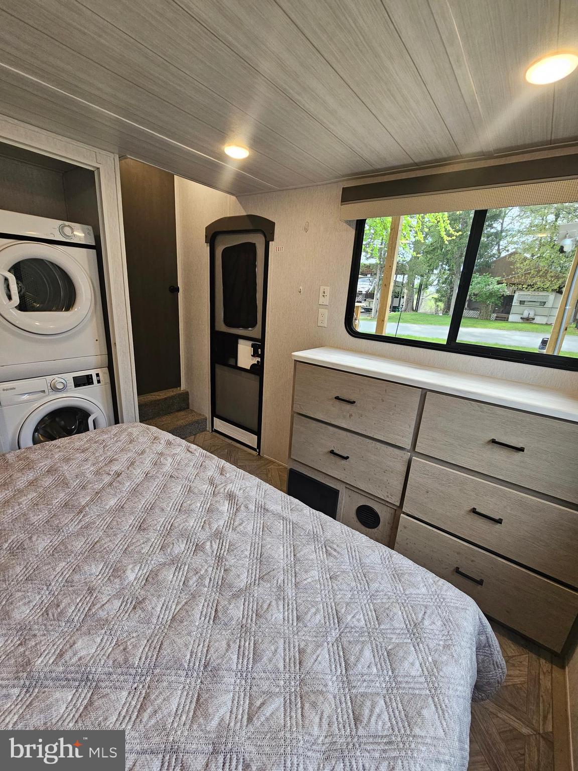 11 Ranger Road Falling Waters, WV 25419 - Photo 34 of 48 a bedroom with a bed and a large window
