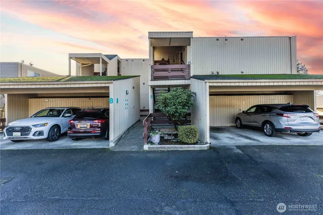 a view of a cars parked in garage