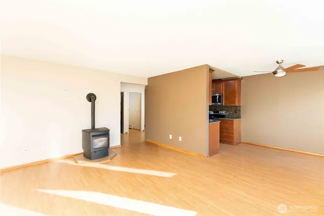 a view of a livingroom with a kitchen