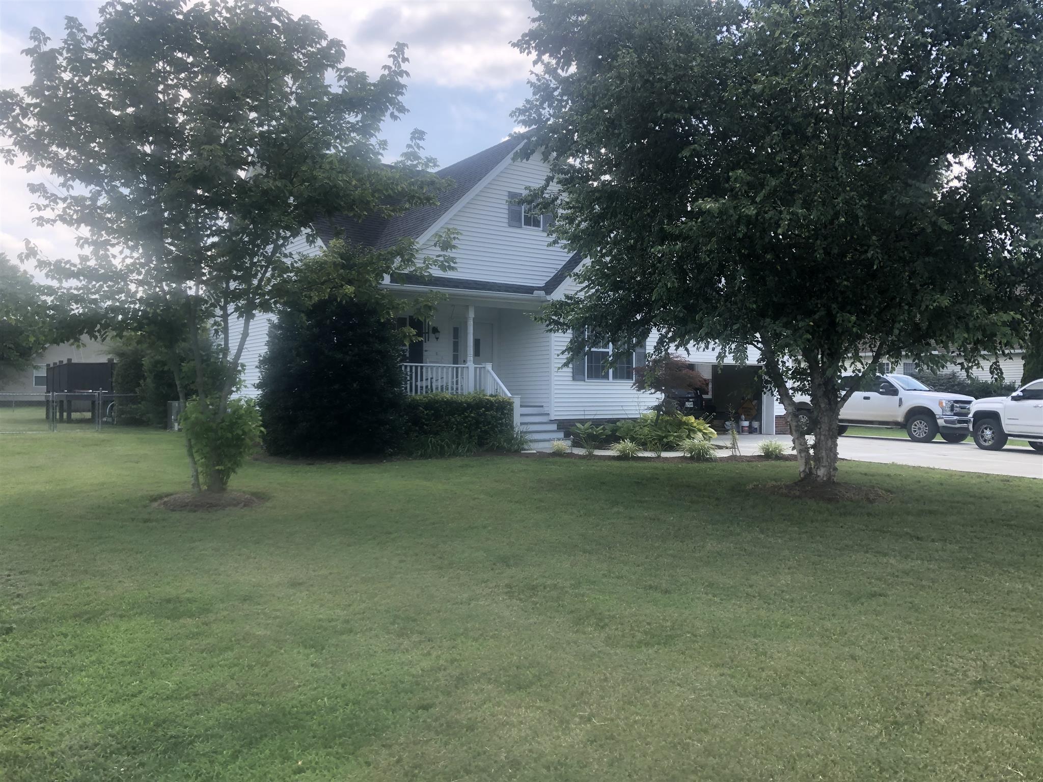 478 Jim Courtney Road Portland, TN 37148 - Photo 3 of 17 a view of a house with a yard