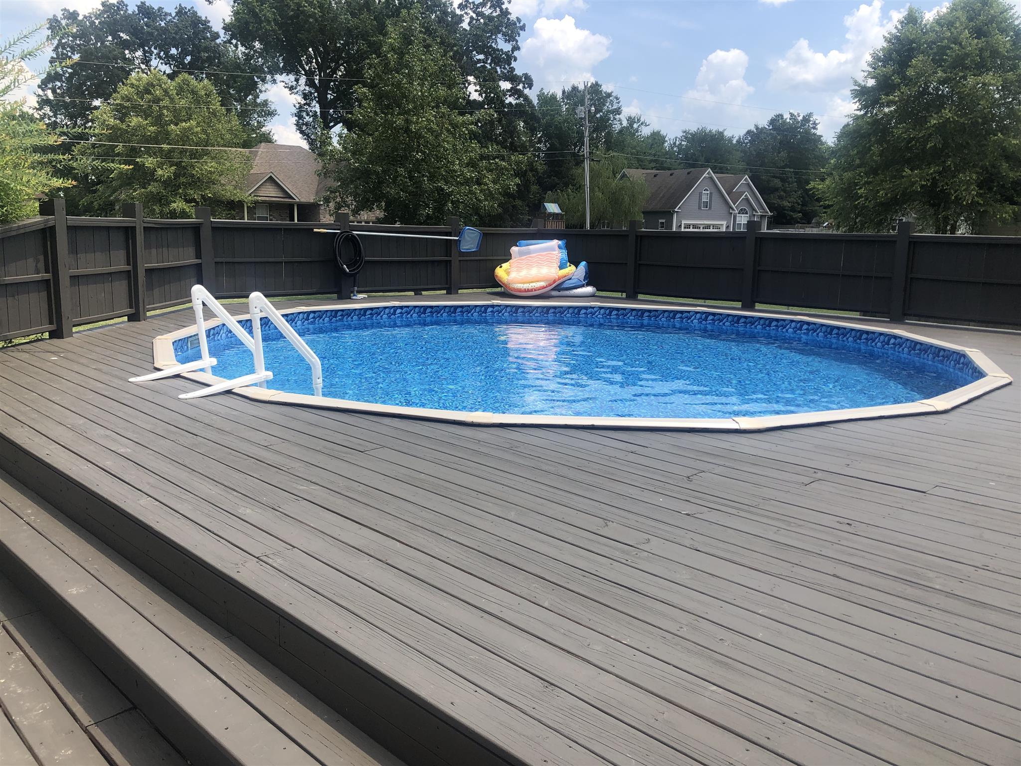 478 Jim Courtney Road Portland, TN 37148 - Photo 6 of 17 a view of a swimming pool with a chair