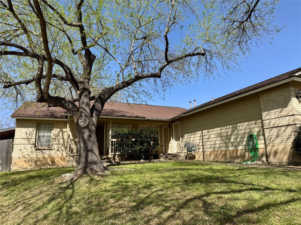 7902 Ibis Cove, Unit A Austin, TX 78745 - Photo 1 of 18 a view of a backyard
