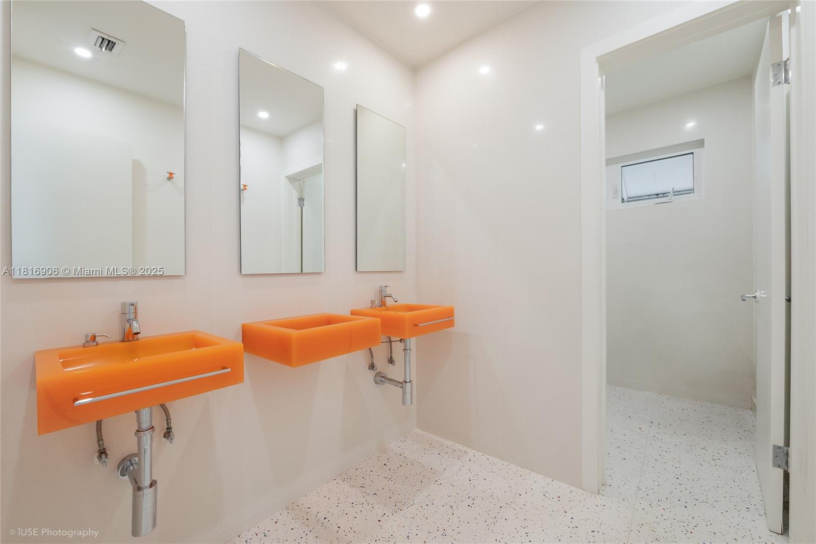 230 Ridgewood Road Coral Gables, FL 33133 - Photo 13 of 19 a bathroom with a sink and a mirror