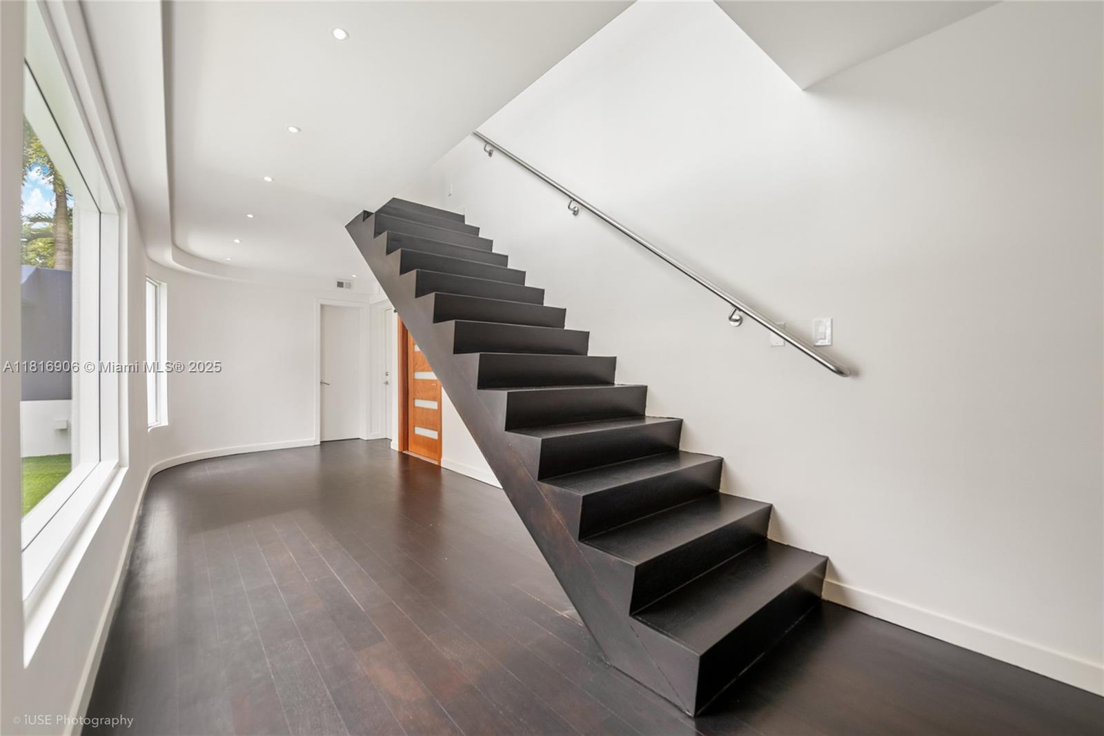 230 Ridgewood Road Coral Gables, FL 33133 - Photo 15 of 19 a view of entryway and hall with wooden floor