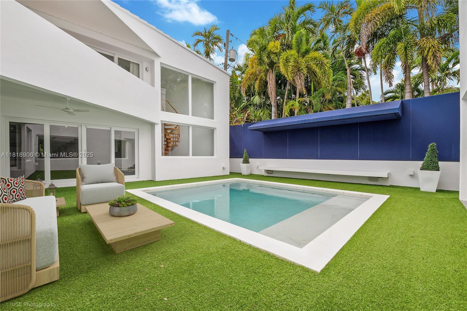 230 Ridgewood Road Coral Gables, FL 33133 - Photo 18 of 19 a view of a house with pool