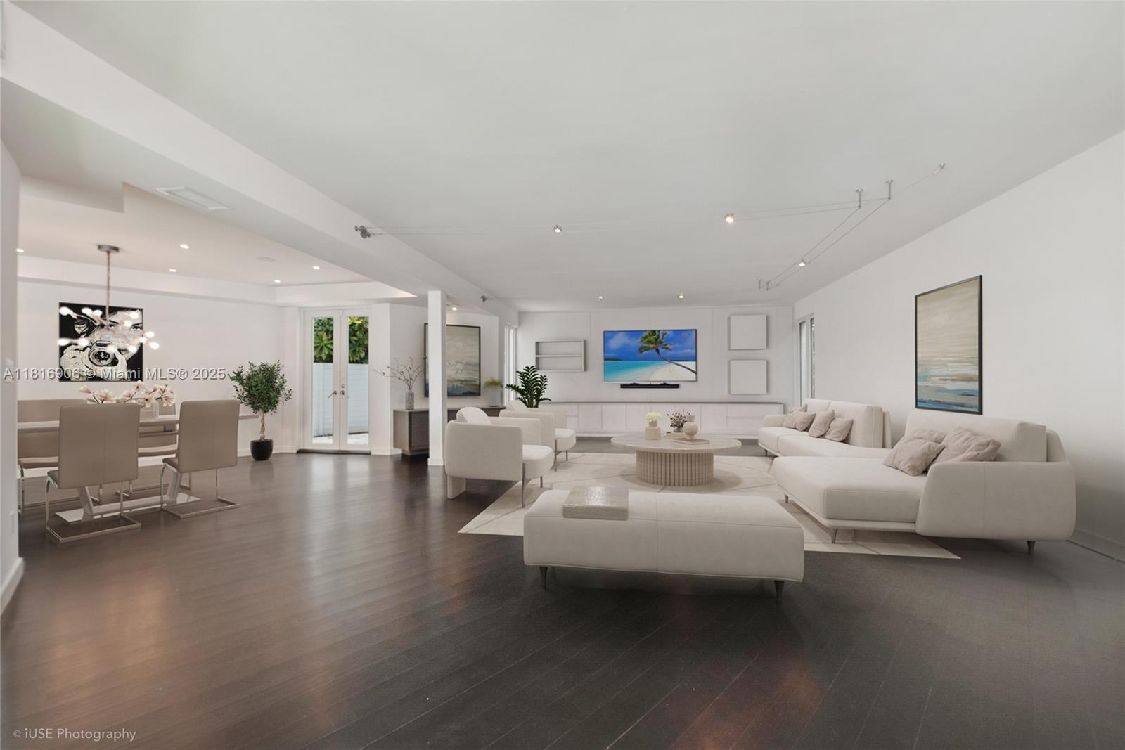 230 Ridgewood Road Coral Gables, FL 33133 - Photo 5 of 19 a living room with furniture and a wooden floor