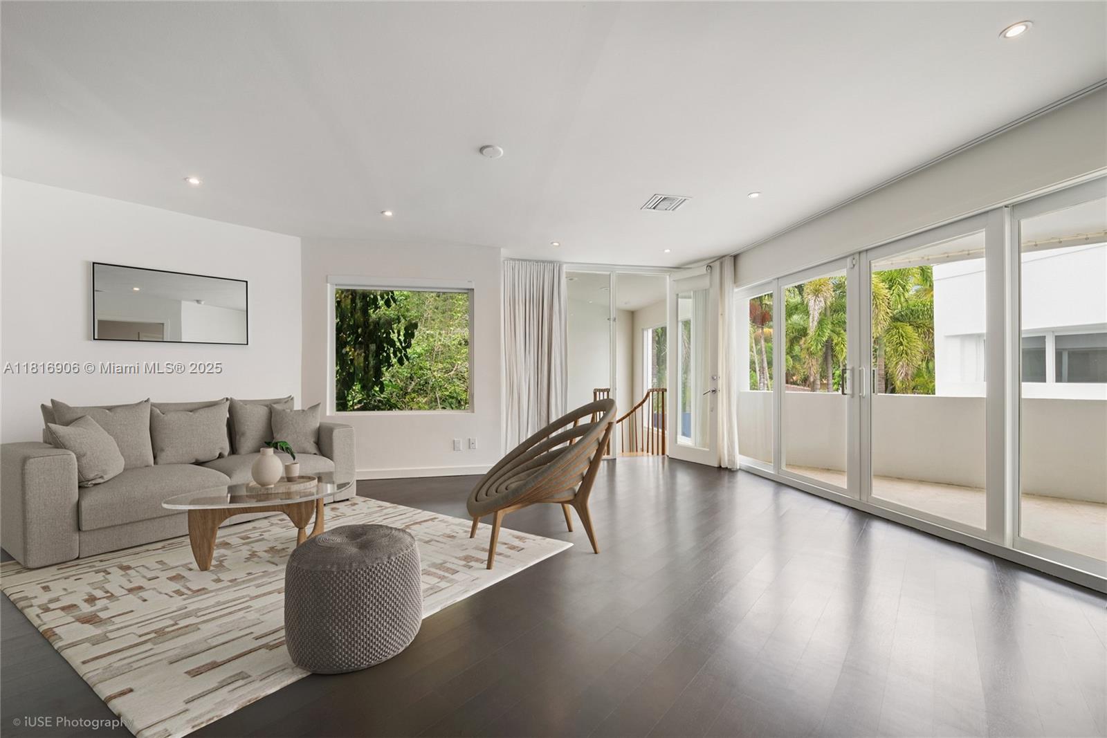 230 Ridgewood Road Coral Gables, FL 33133 - Photo 9 of 19 a living room with furniture and large windows