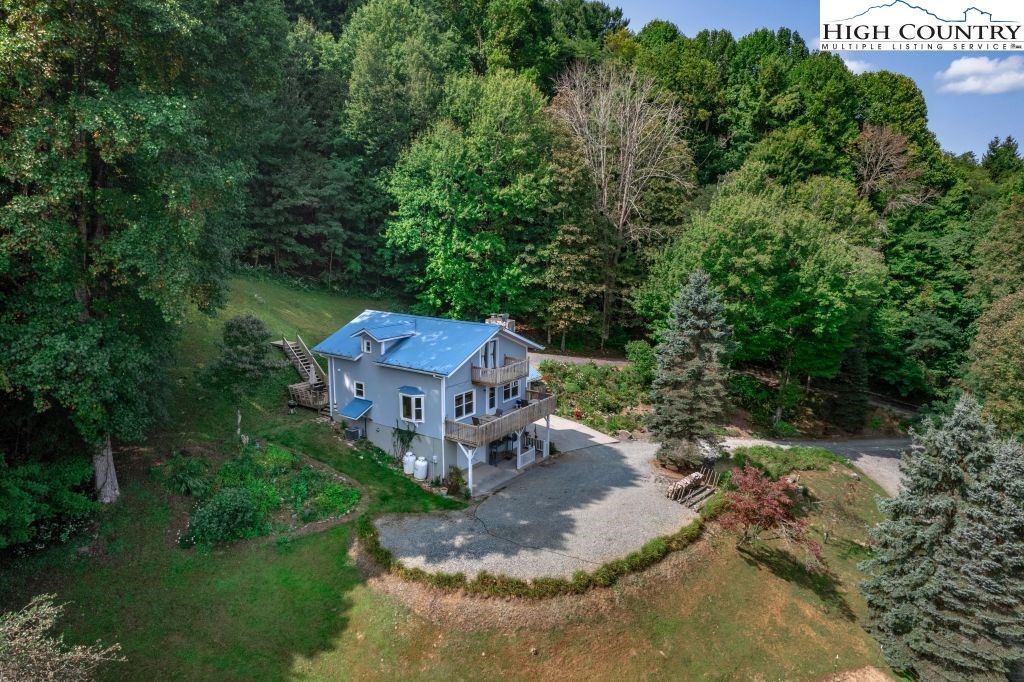 1005 Andy Hicks Road Banner Elk, NC 28604 - Photo 1 of 44 an aerial view of a house with a garden
