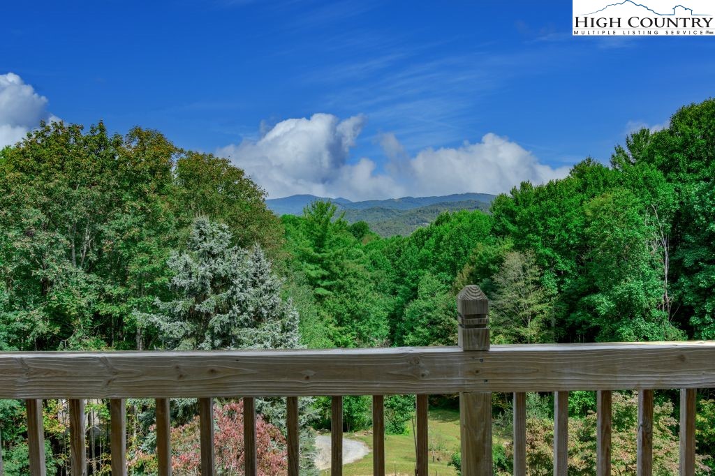 1005 Andy Hicks Road Banner Elk, NC 28604 - Photo 33 of 44 a view of a back yard from a balcony