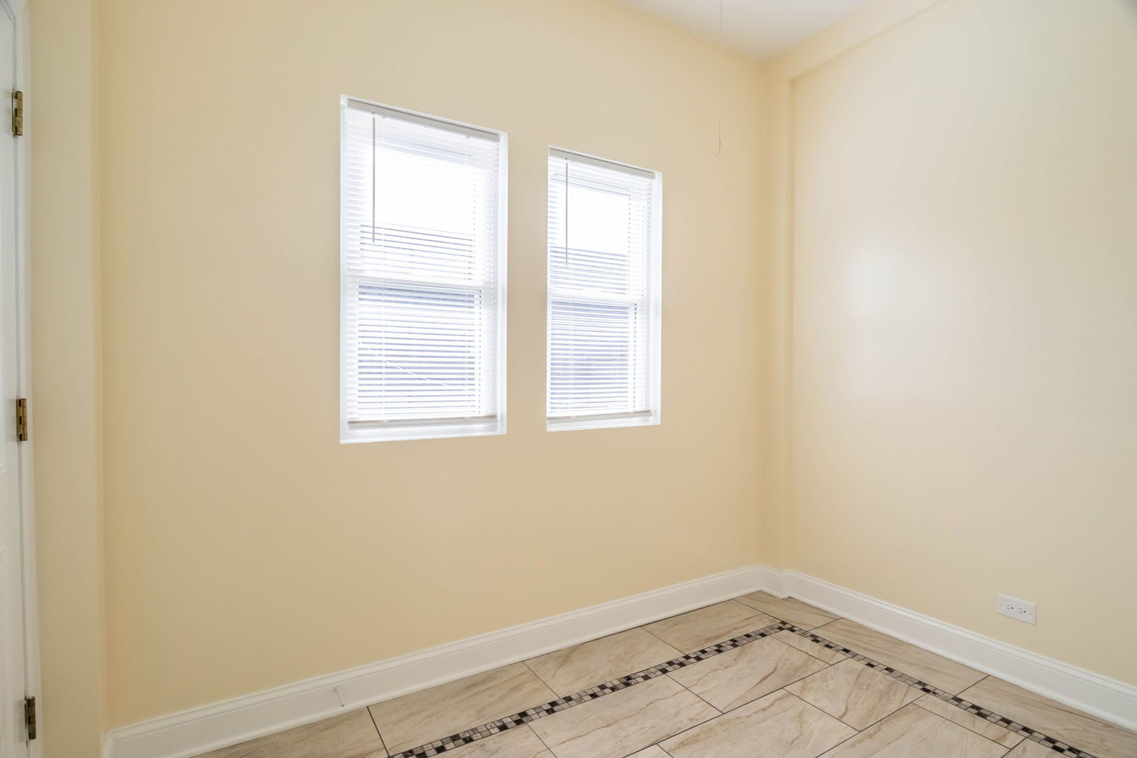 4837 West Monroe Street, Unit 2 Chicago, IL 60644 - Photo 19 of 21 an empty room with a window