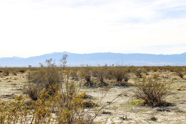 a view of lake and mountain