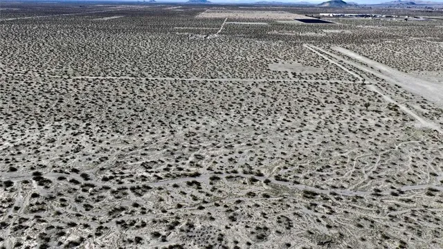 a bathroom with a black white checkered floor