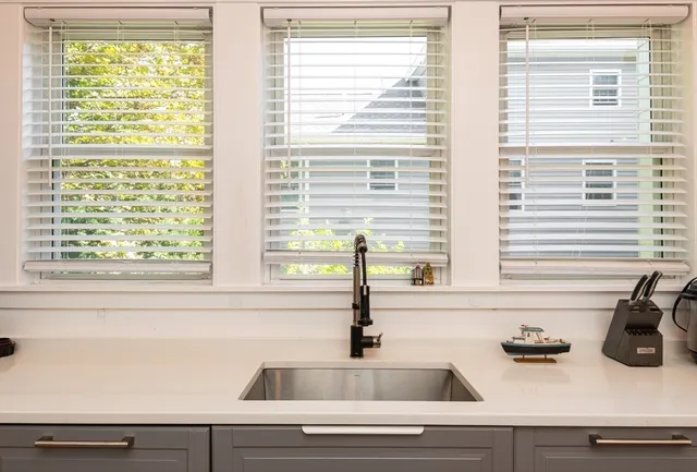 a kitchen with appliances and cabinets