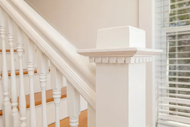 a room with a bed and a desk