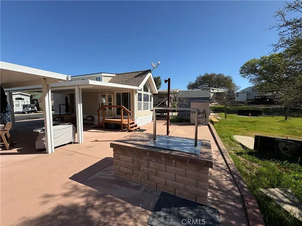 a bathroom with a sink toilet and mirror