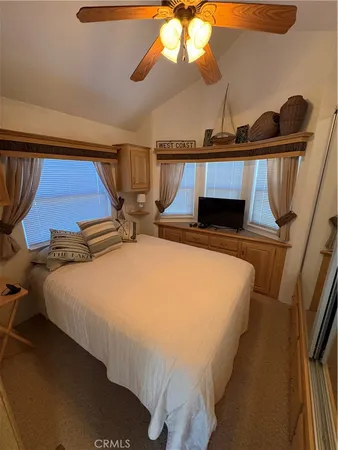 a dining room with furniture window and wooden floor
