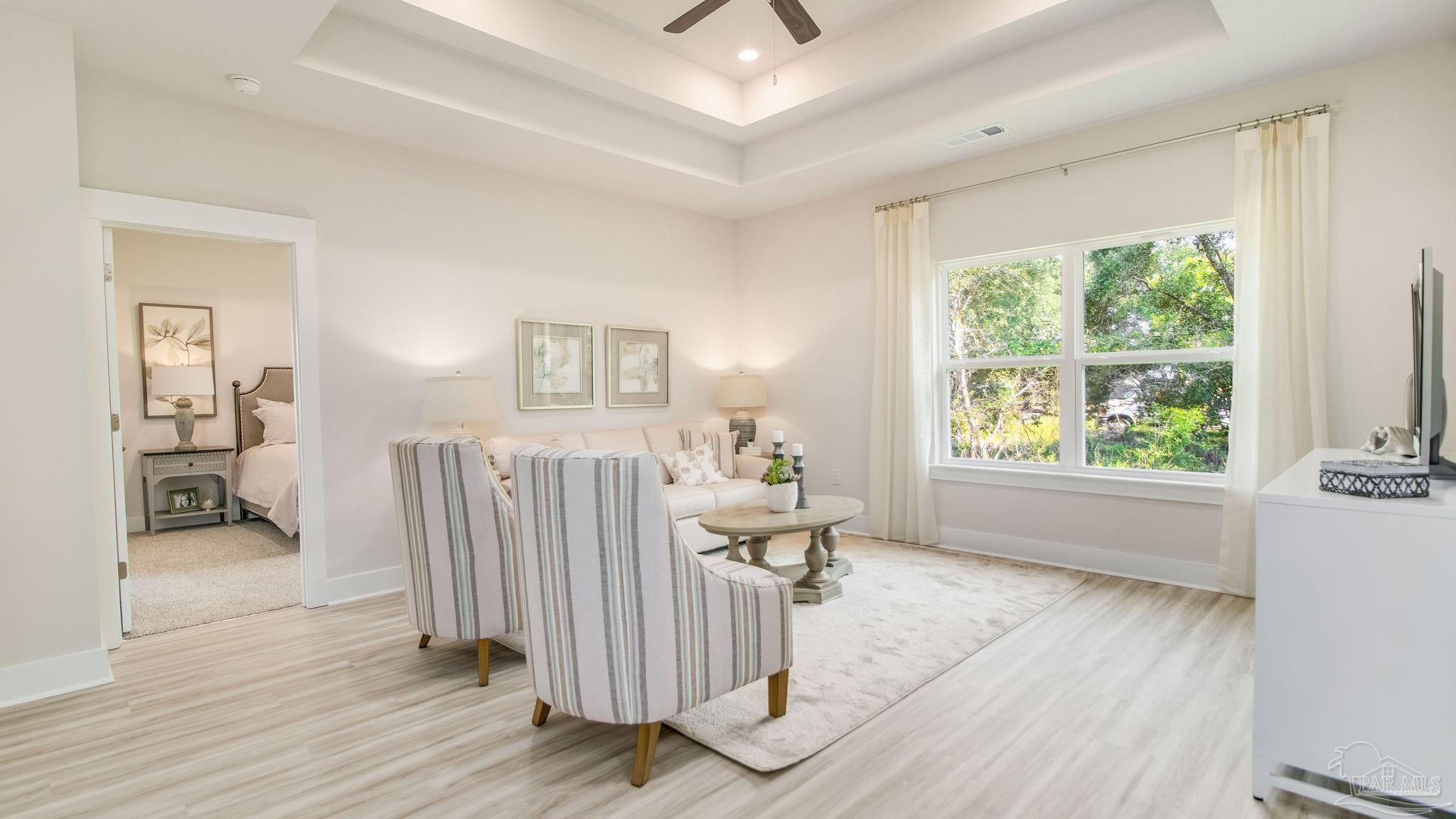 5829 Dove Nest Road Gulf Breeze, FL 32563 - Photo 12 of 31 a view of livingroom with furniture and wooden floor