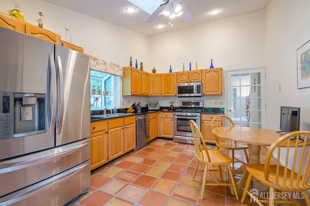 a room with a bed and a view of bedroom