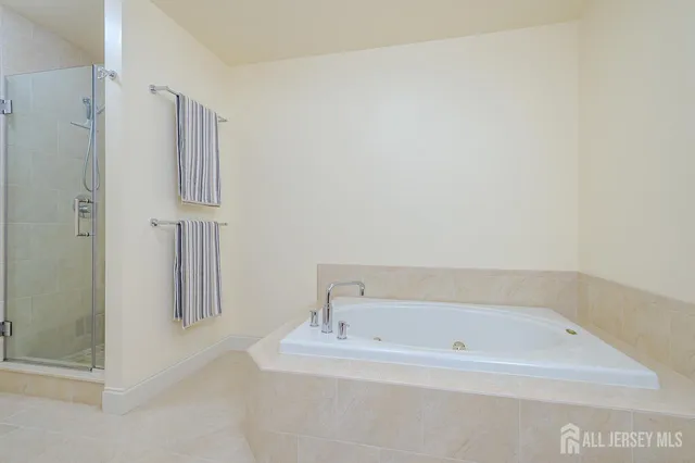 a view of a livingroom with furniture and staircase