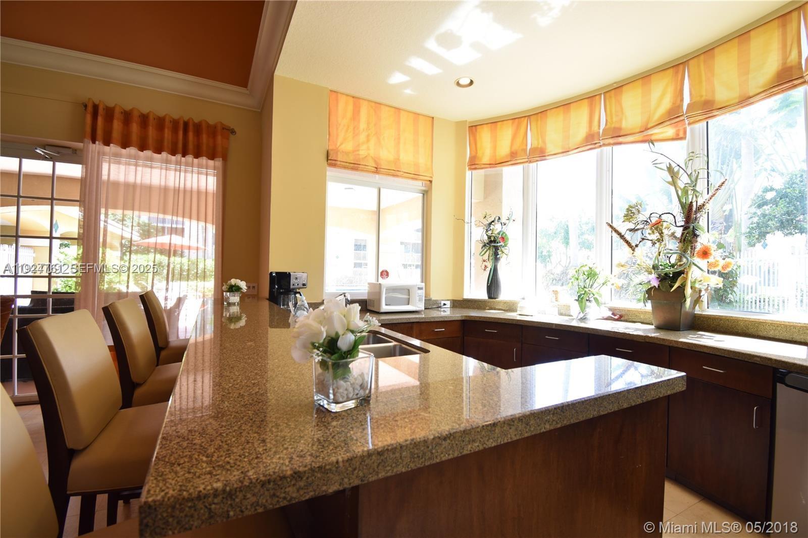 410 South Park Road, Unit 207 Hollywood, FL 33021 - Photo 43 of 47 a view of a dining room with furniture window and outside view