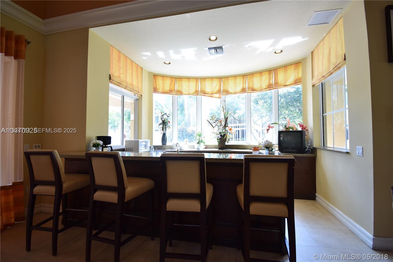410 South Park Road, Unit 207 Hollywood, FL 33021 - Photo 45 of 47 a dining room with furniture and window