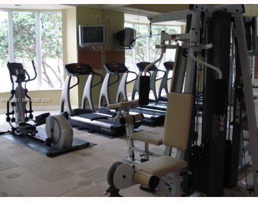 410 South Park Road, Unit 207 Hollywood, FL 33021 - Photo 46 of 47 a view of a room with gym equipment
