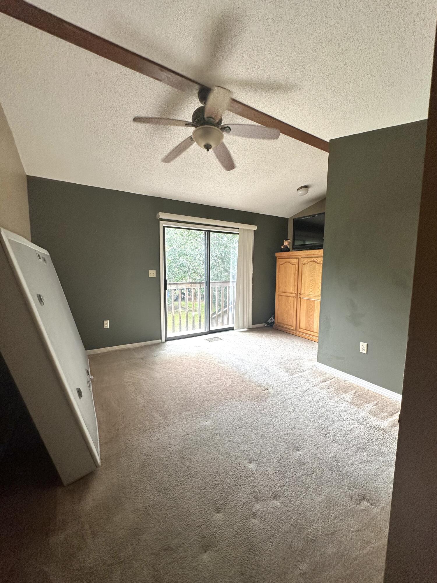 128 Dolphin Cove Freeport, FL 32439 - Photo 25 of 36 a view of an empty room with a window