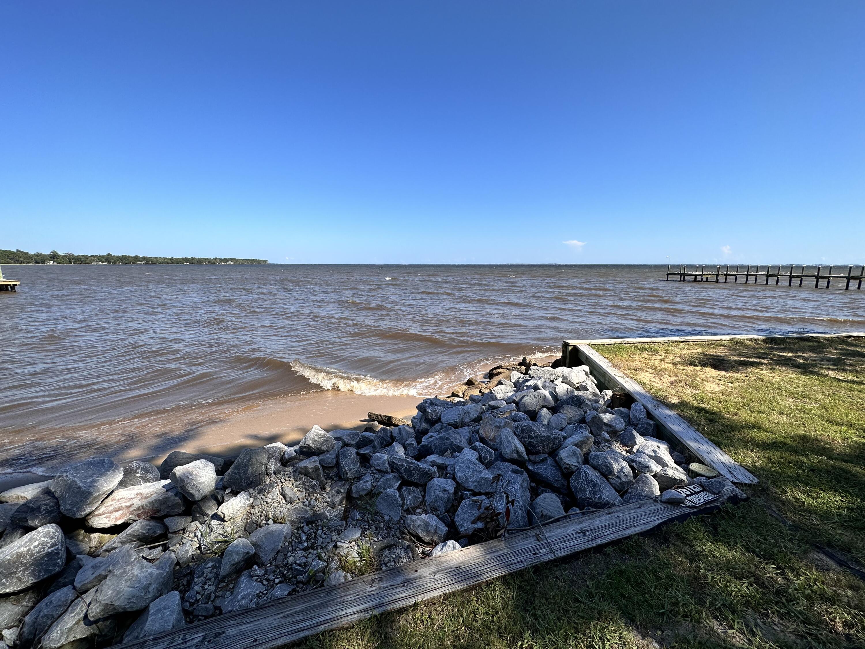 128 Dolphin Cove Freeport, FL 32439 - Photo 29 of 36 a view of a swimming pool and an outdoor space