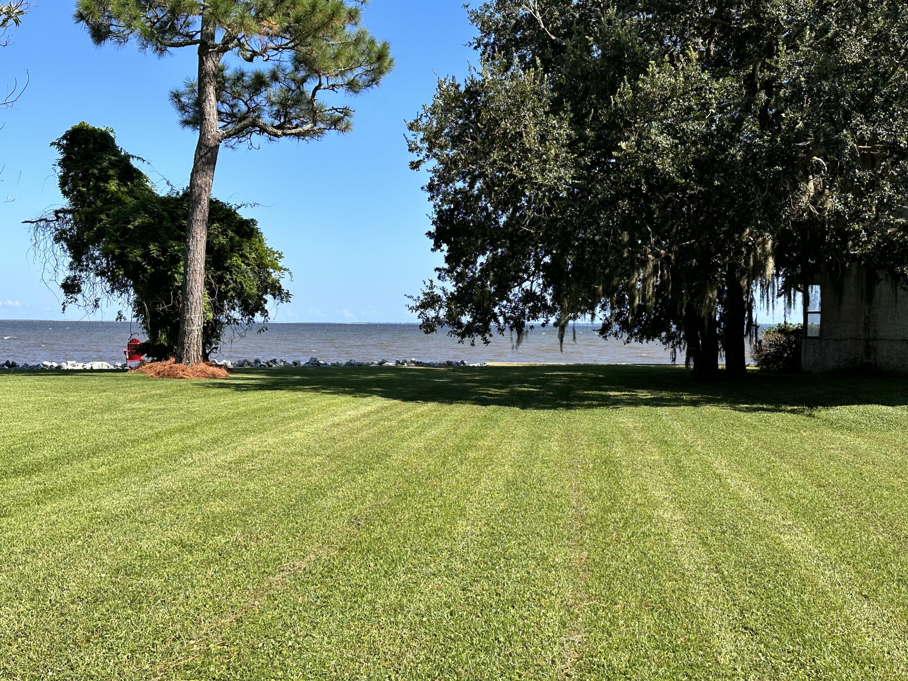 128 Dolphin Cove Freeport, FL 32439 - Photo 30 of 36 a view of a yard