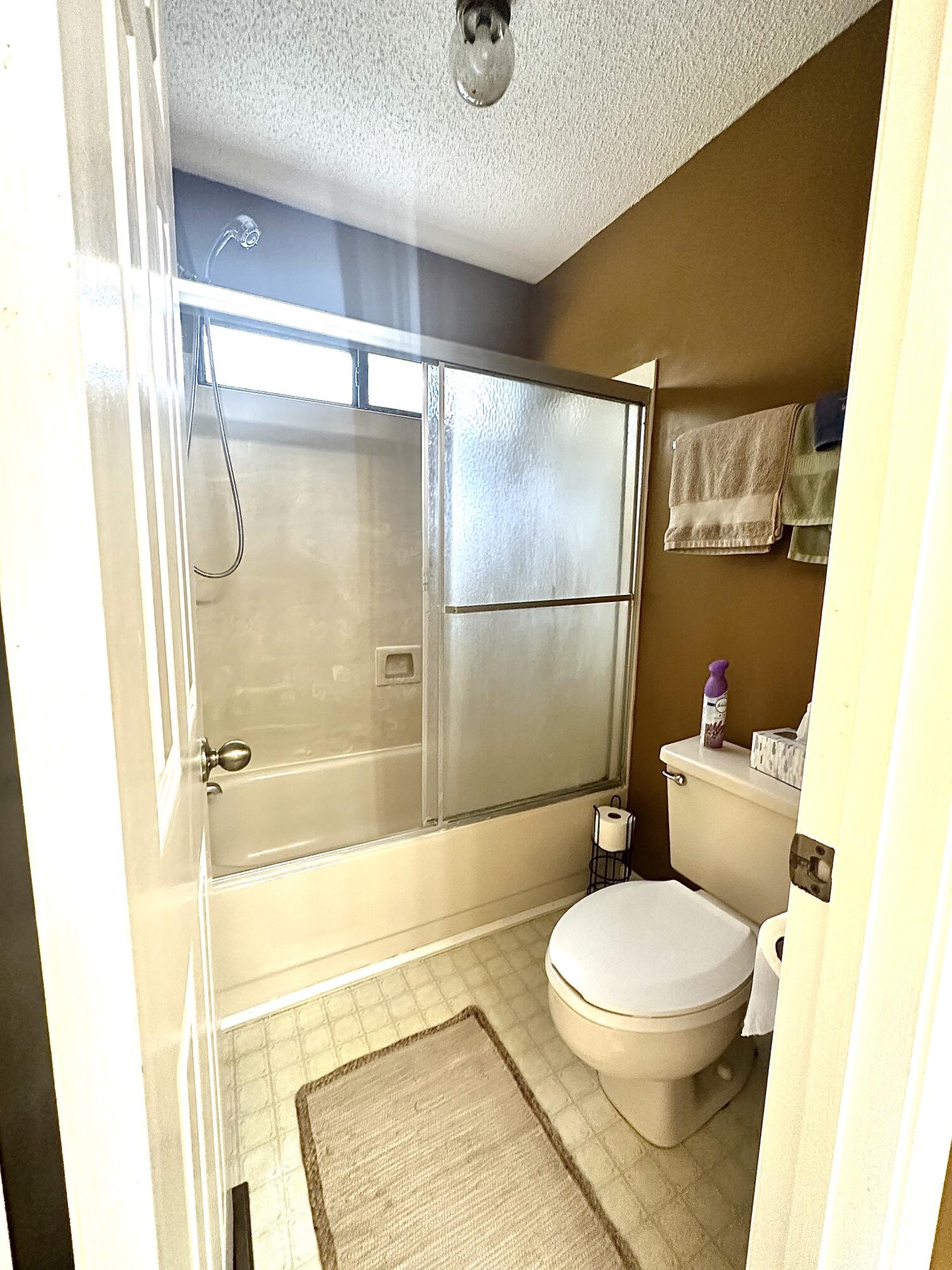 128 Dolphin Cove Freeport, FL 32439 - Photo 36 of 36 a bathroom with a toilet and a shower