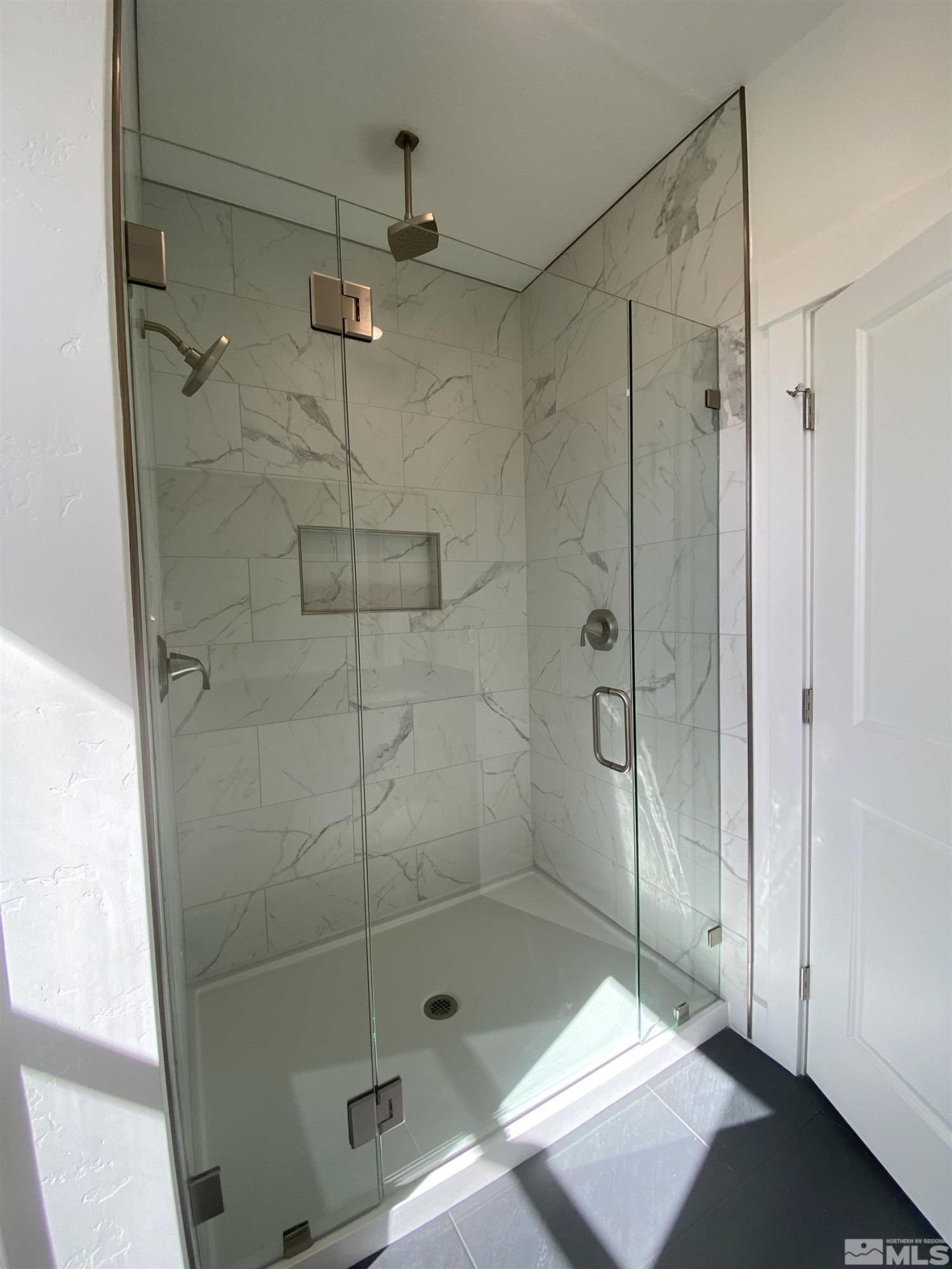 5950 Packsaddle Road Winnemucca, NV 89445 - Photo 8 of 14 a bathroom with a shower