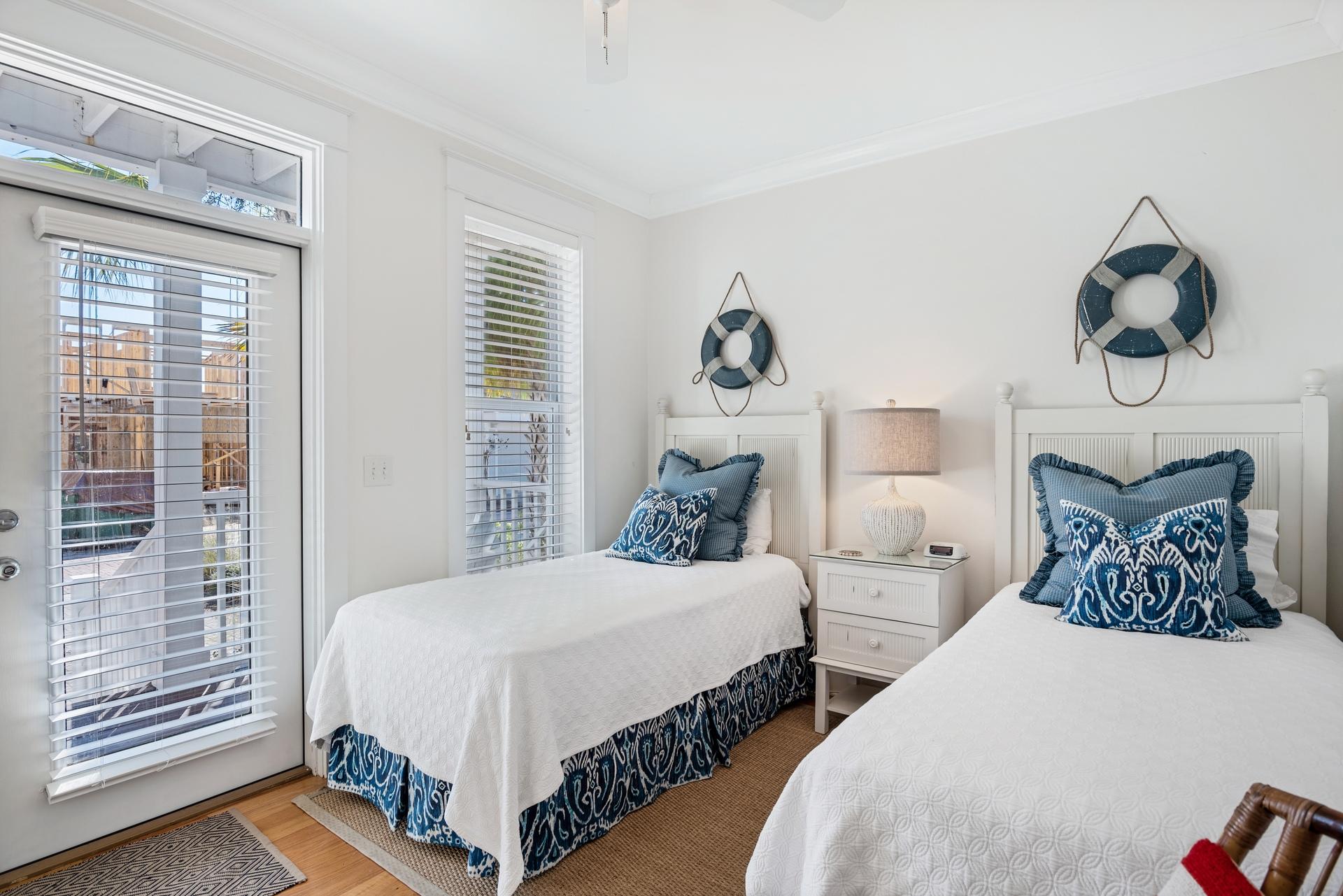 22 Moonlight Beach Lane Inlet Beach, FL 32461 - Photo 11 of 45 a bedroom with two beds and a window