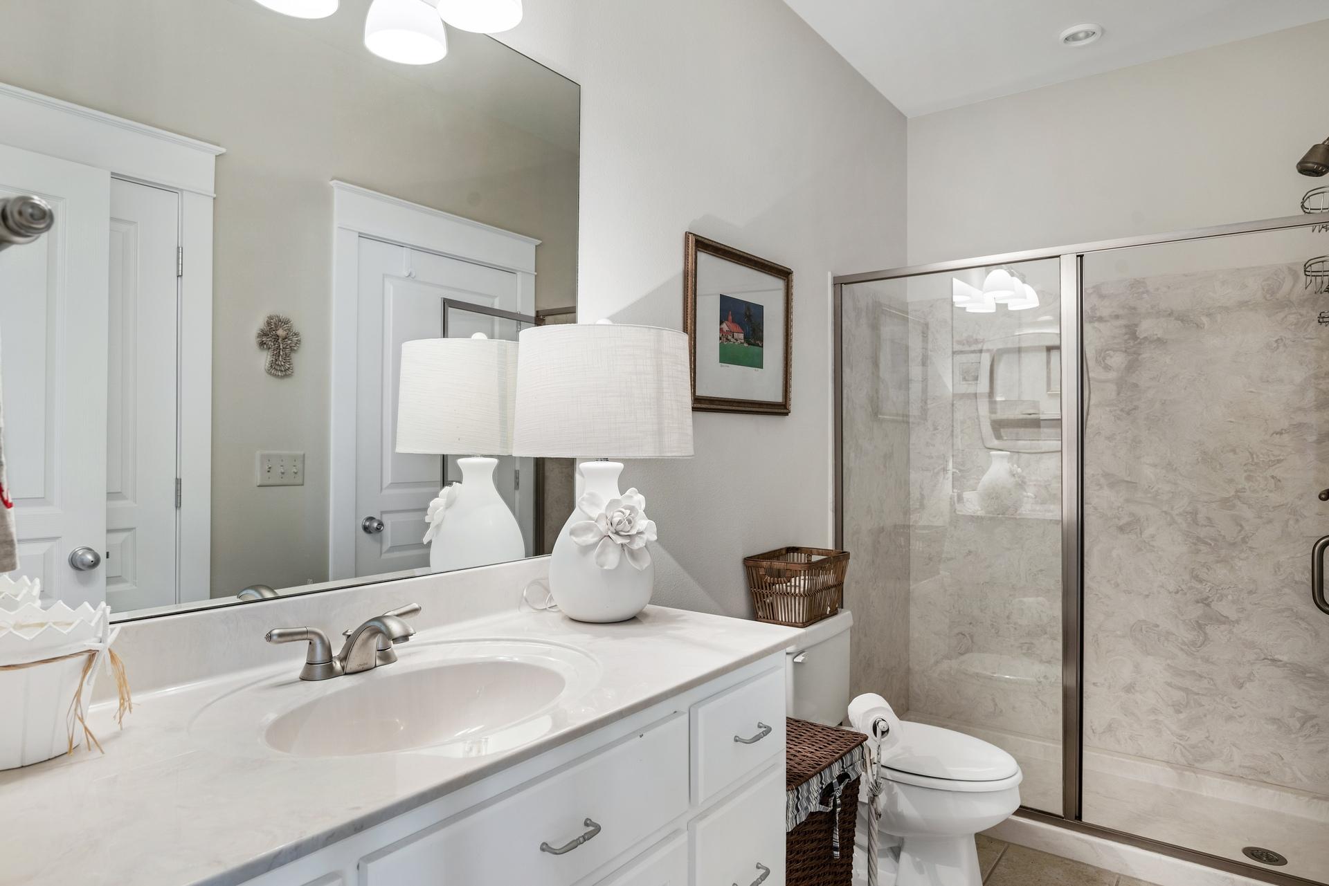 22 Moonlight Beach Lane Inlet Beach, FL 32461 - Photo 13 of 45 a bathroom with a sink toilet and shower