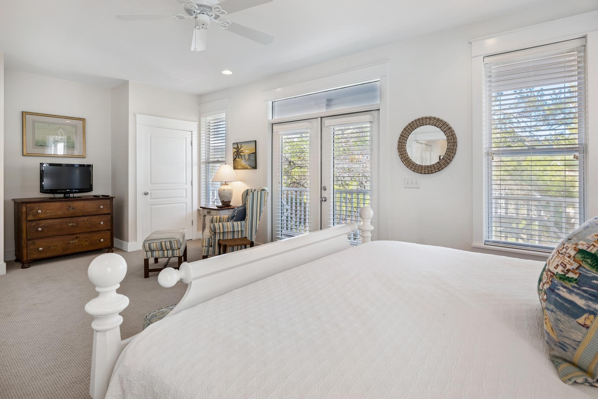 22 Moonlight Beach Lane Inlet Beach, FL 32461 - Photo 25 of 45 a bedroom with a bed and a chandelier