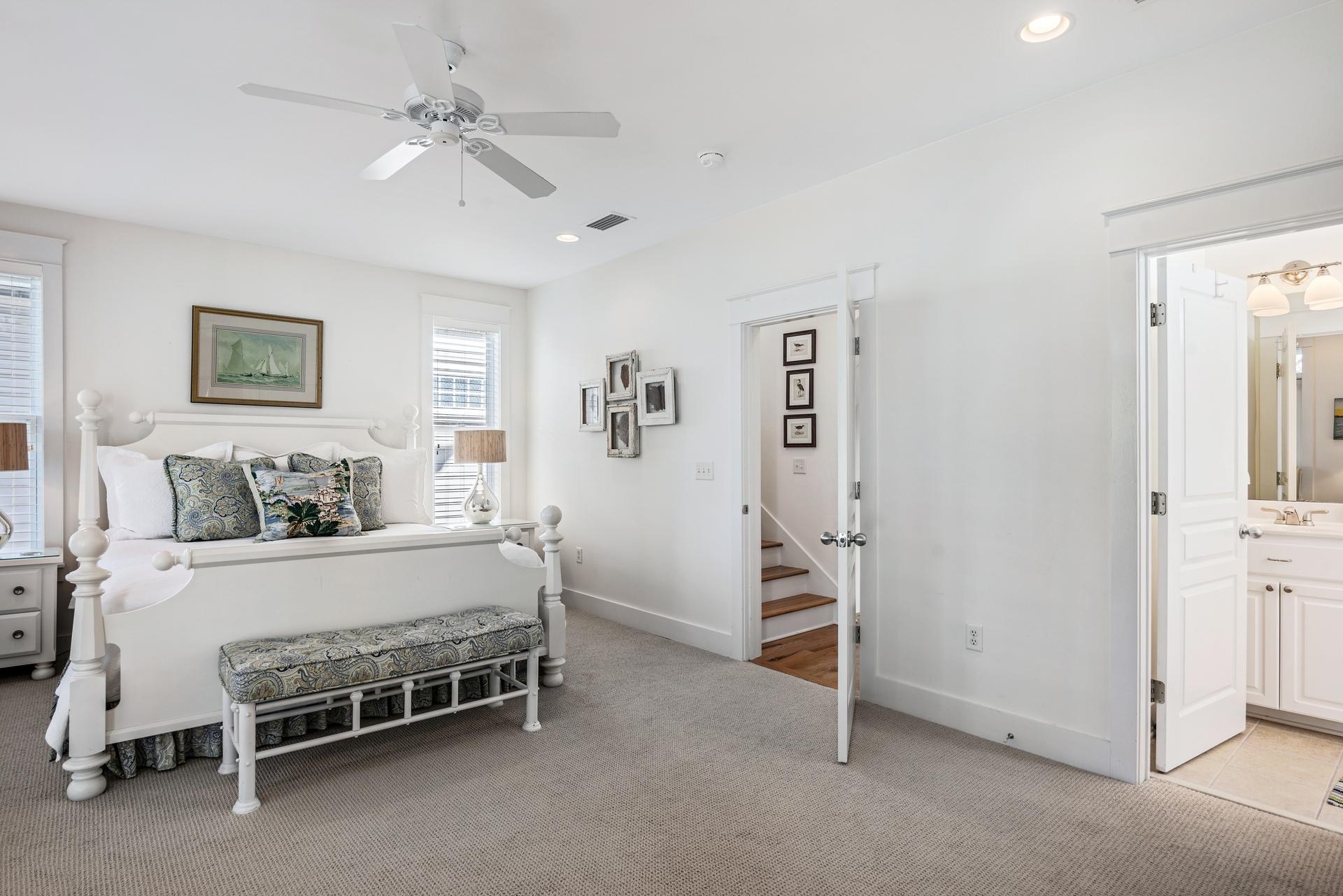 22 Moonlight Beach Lane Inlet Beach, FL 32461 - Photo 26 of 45 a bedroom with a bed and a chandelier
