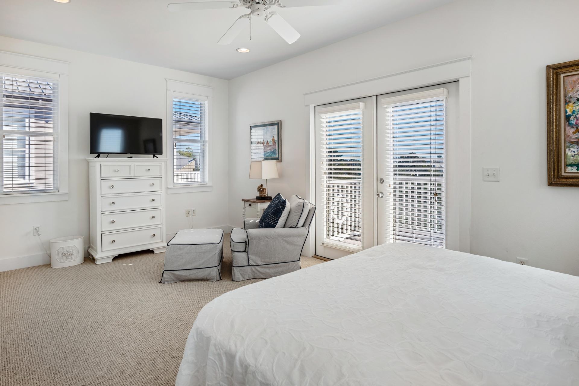 22 Moonlight Beach Lane Inlet Beach, FL 32461 - Photo 29 of 45 a bedroom with a bed a flat screen tv and dresser