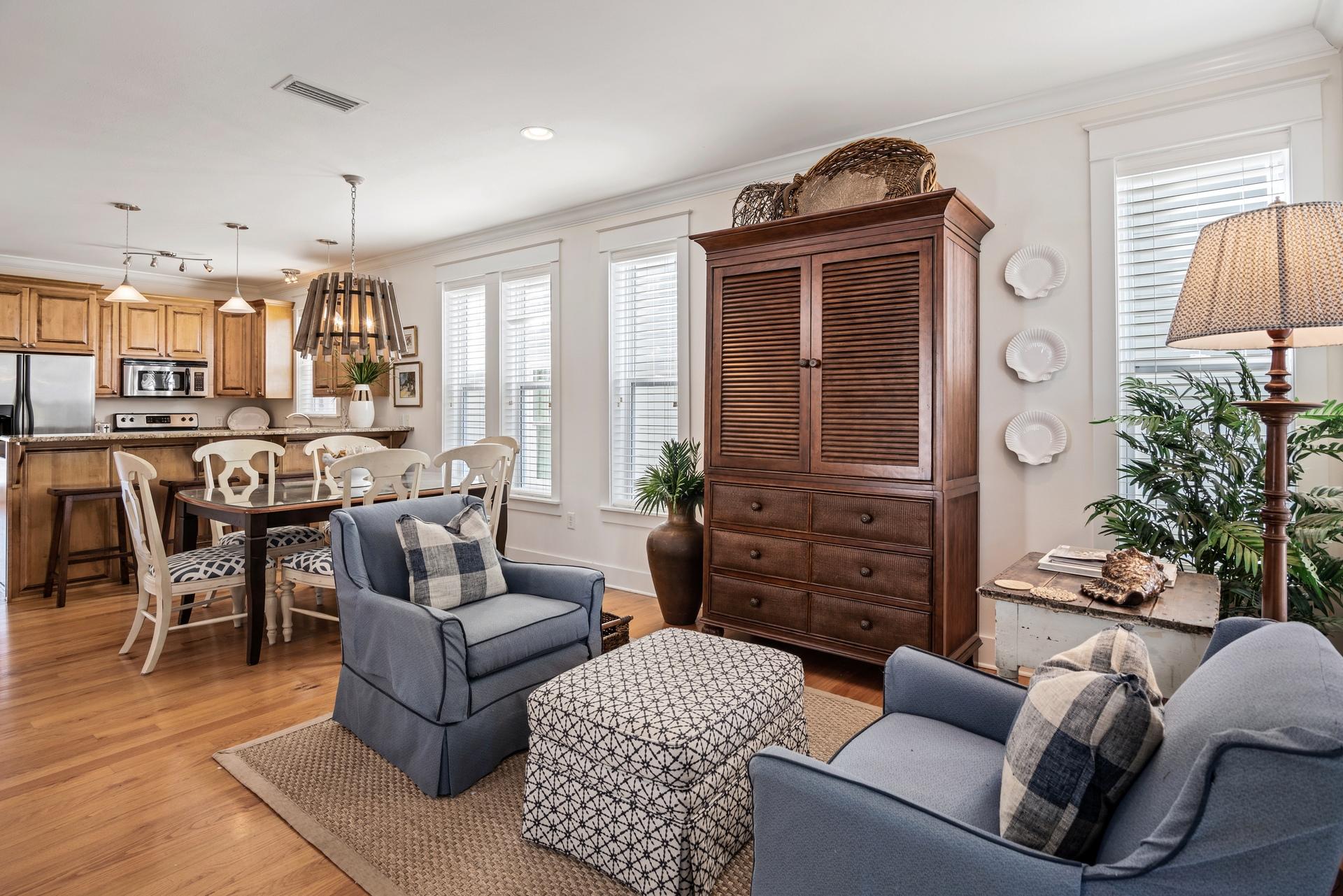 22 Moonlight Beach Lane Inlet Beach, FL 32461 - Photo 6 of 45 a living room with furniture a fireplace and a chandelier