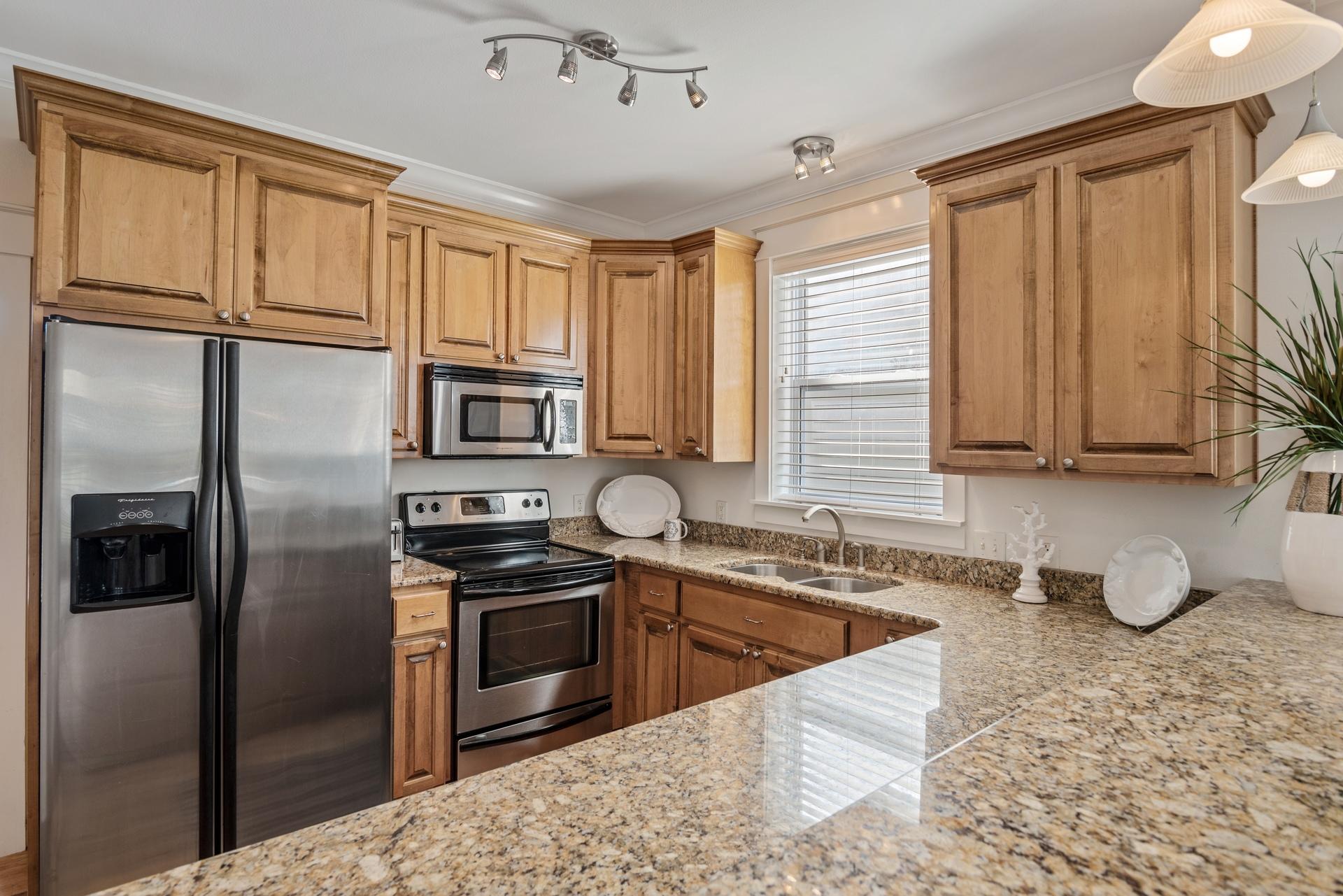 22 Moonlight Beach Lane Inlet Beach, FL 32461 - Photo 10 of 45 a kitchen with stainless steel appliances granite countertop a refrigerator sink and stove