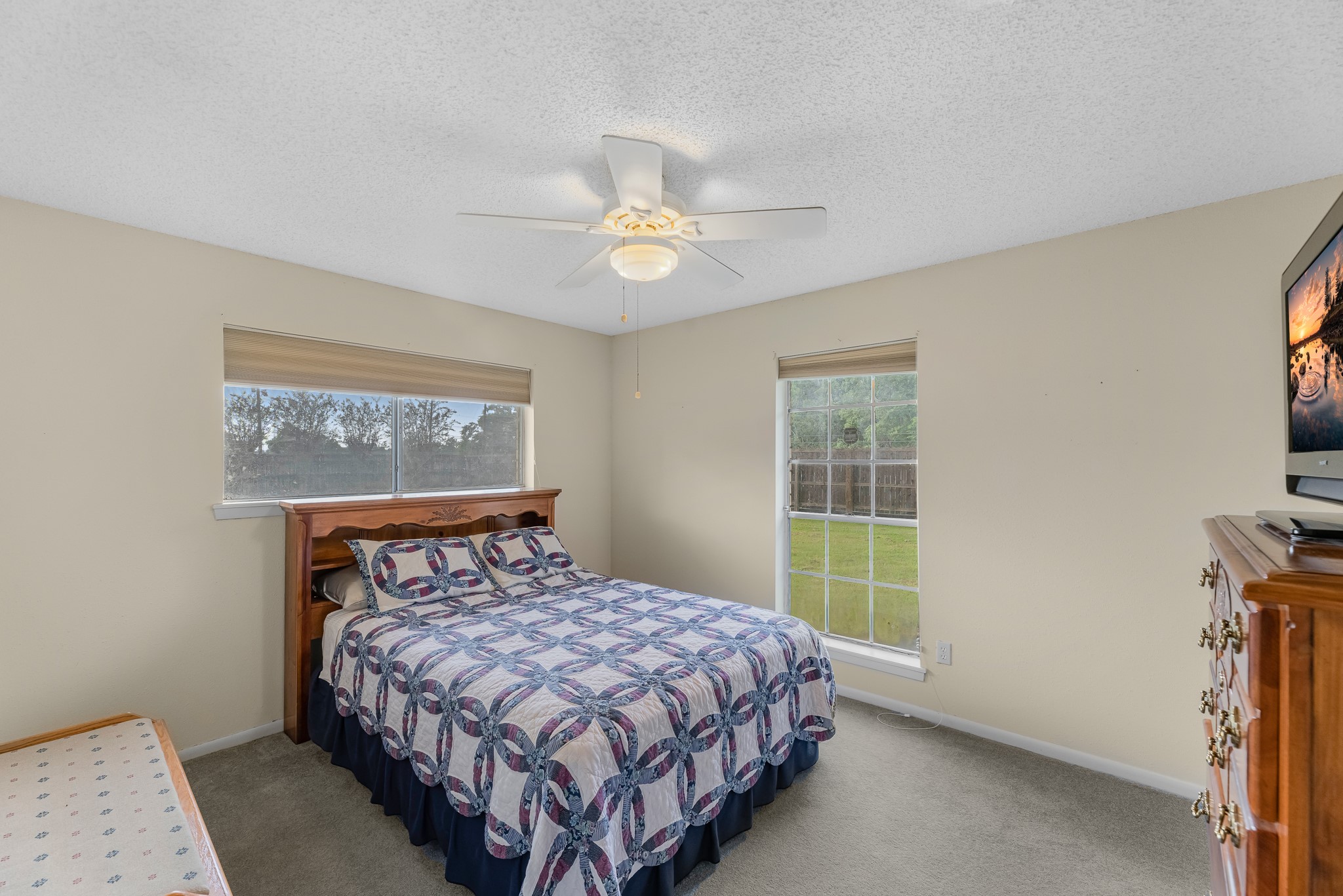7315 Pine Street Manvel, TX 77578 - Photo 26 of 50 a bedroom with a bed and a window