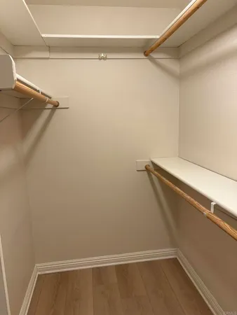 a view of small space with racks on the wall