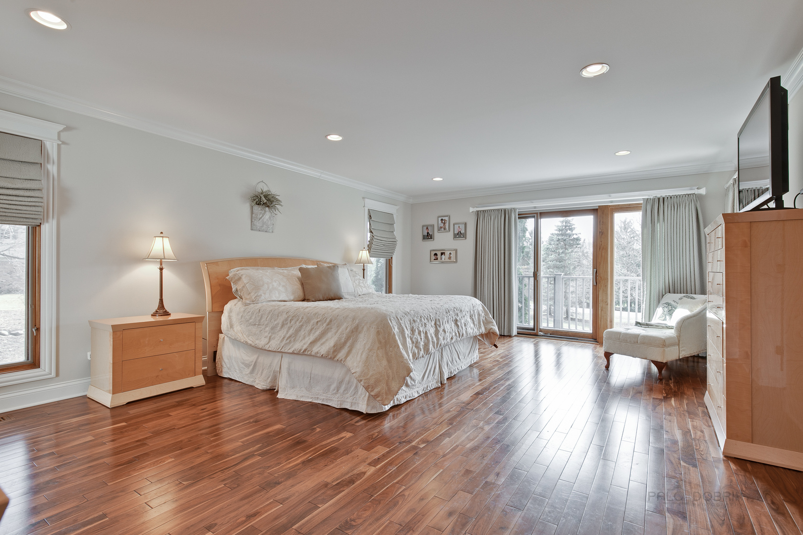 861 Muirfield Road Inverness, IL 60067 - Photo 22 of 42 a bedroom with a large bed and a large window