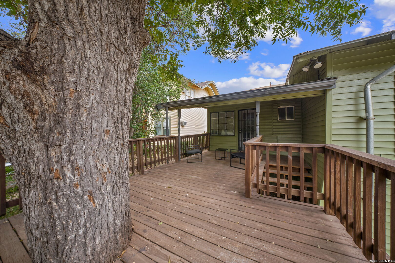 636 Rigsby Avenue San Antonio, TX 78210 - Photo 18 of 23 a view of house with deck and wooden floor