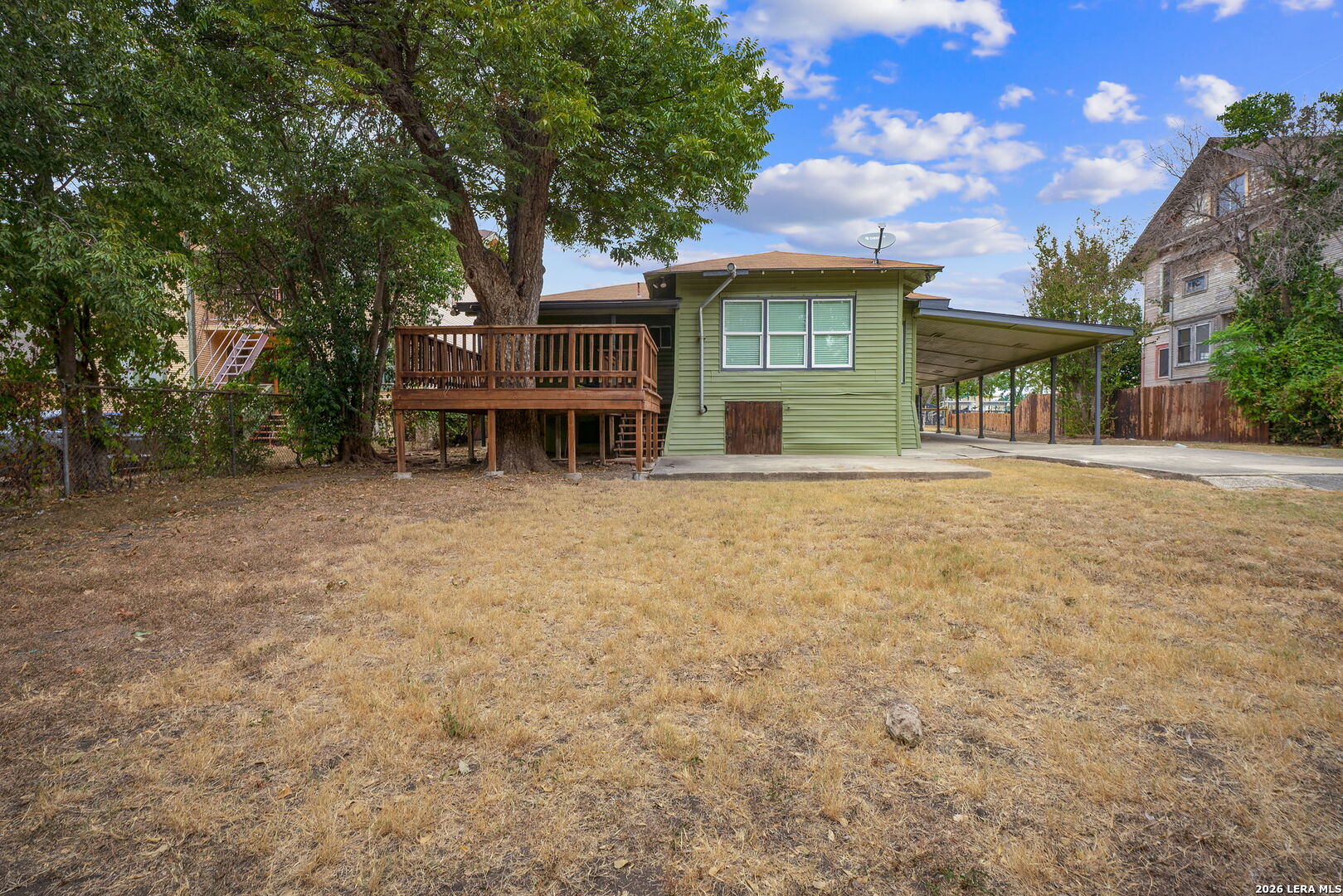636 Rigsby Avenue San Antonio, TX 78210 - Photo 20 of 23 a view of house with outdoor space and trees in the background