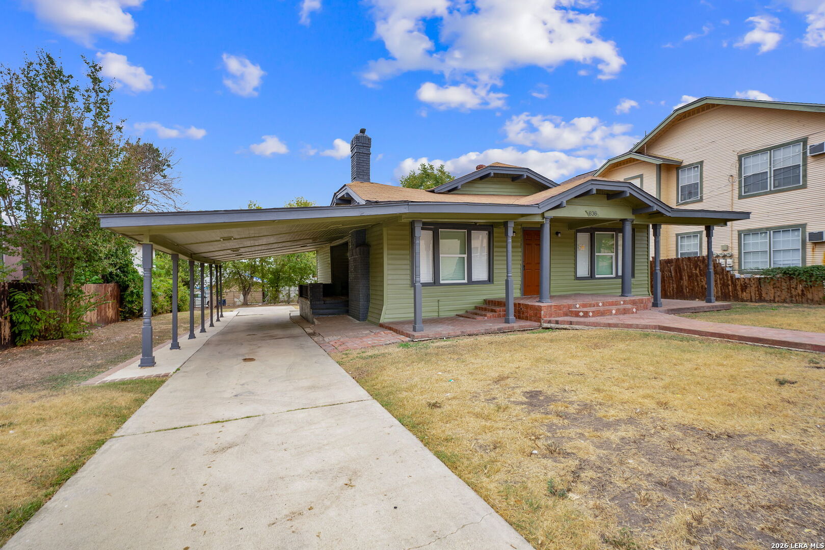 636 Rigsby Avenue San Antonio, TX 78210 - Photo 3 of 23 a front view of a house with a porch