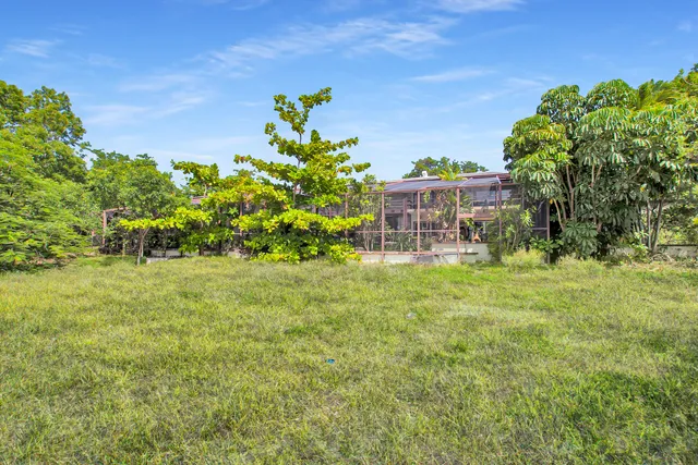 a view of a chairs and table in the garden