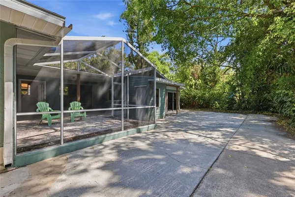 a view of a road with trees in front of it