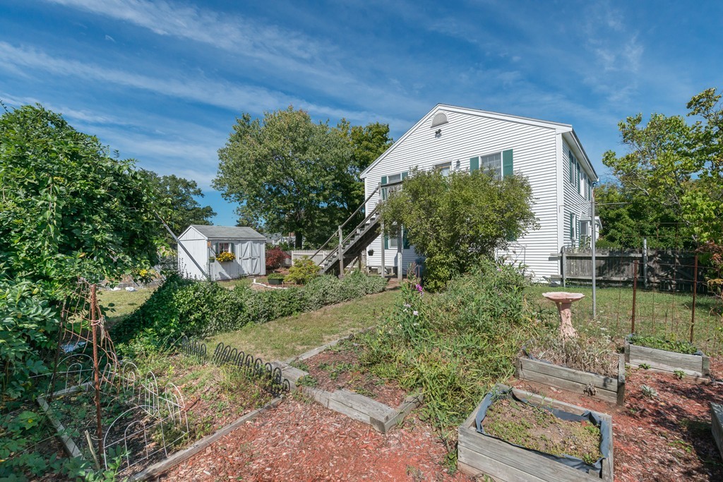 62 Beach Road Salisbury, MA 01952 - Photo 18 of 20 a picture of a yard