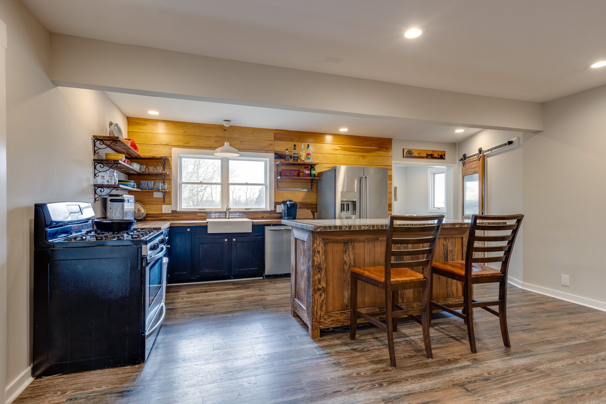 3111 Lewis Road Santa Fe, TN 38482 - Photo 11 of 40 a kitchen with a sink cabinets and wooden floor